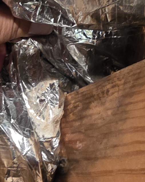 Mold growth visible on HVAC ductwork in the gym attic